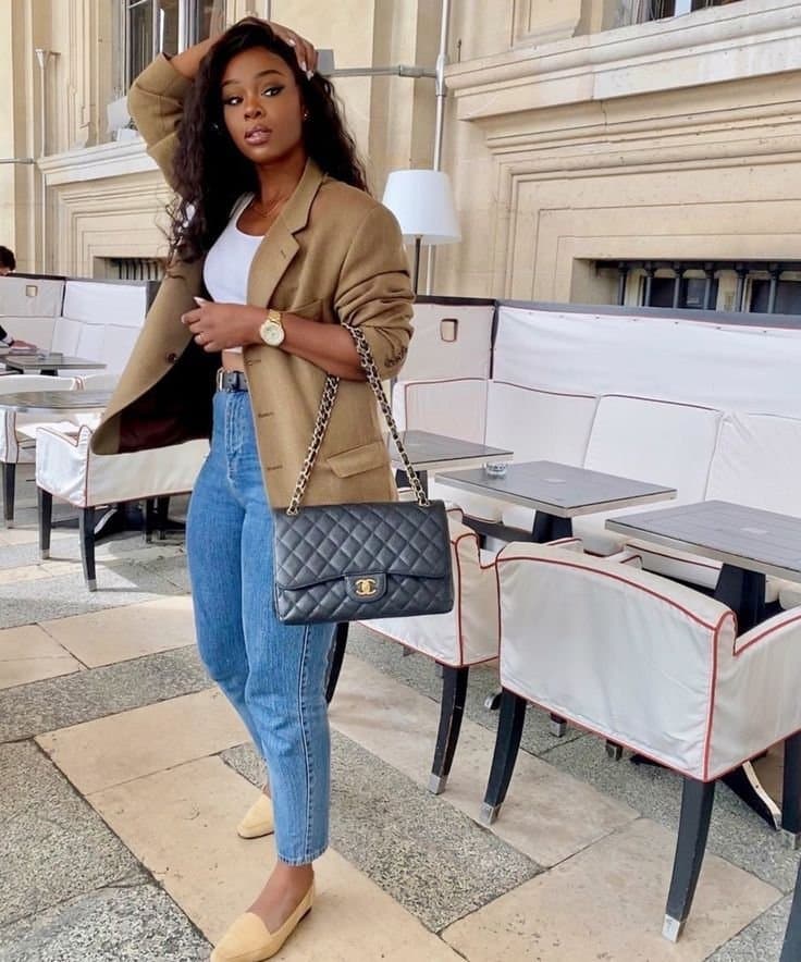 Paris wearing a blazer and jeans